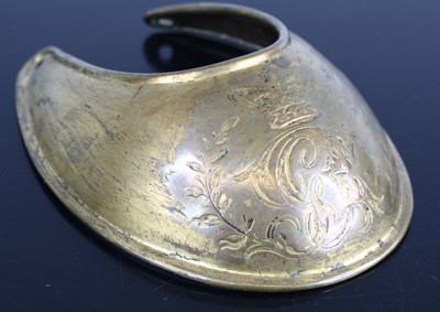 Lot 598 - A George III/VI brass gorget, of typical...
