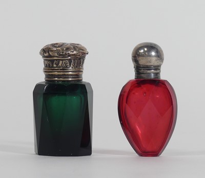 Lot 312 - An Edwardian faceted green glass scent bottle,...