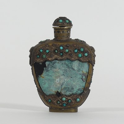 Lot 310 - A Tibetan stone snuff bottle, having a...