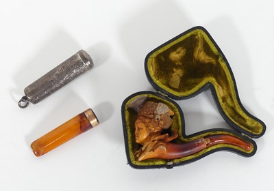 Lot 451 - A simulated amber cheroot holder, having a 9ct...