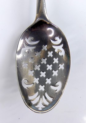 Lot 2069 - A George III silver mote spoon, having cross...