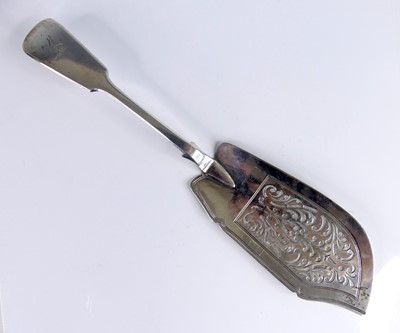 Lot 2085 - A William IV silver fish slice, in the Fiddle...