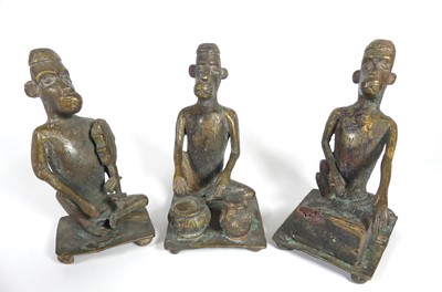 Lot 475 - A set of three African tribal brass monkey...