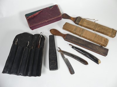 Lot 484 - A Crown and Sword straight razor together with...