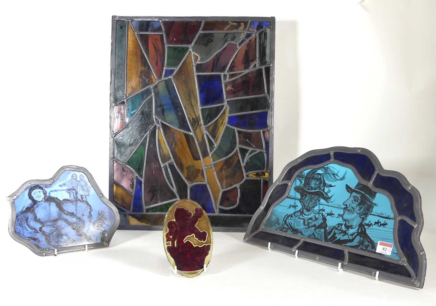 Lot 82 - A group of four 20th century stained glass...
