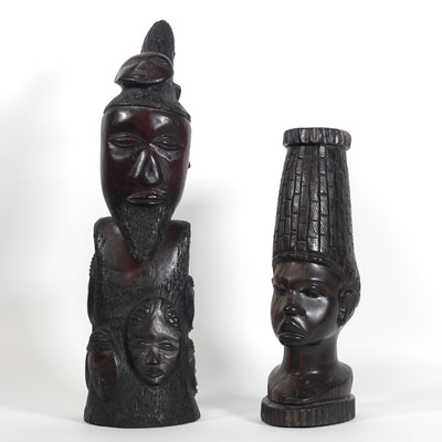 Lot 44 - An African carved hardwood figure, with mask...