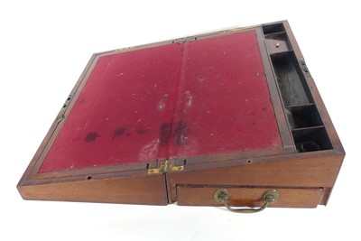 Lot 69 - A 19th century rosewood brass mounted writing...