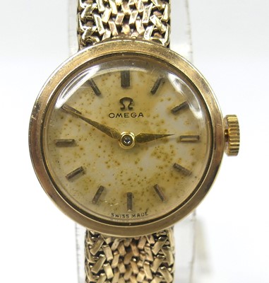 Lot 2504 - A lady's Omega 9ct gold cased bracelet watch,...