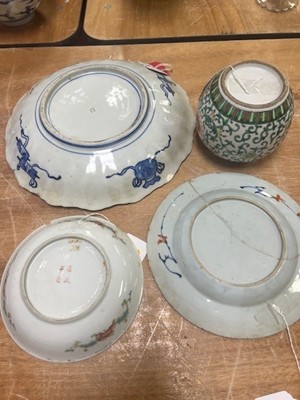 Lot 61 - A collection of nine Japanese polychrome...