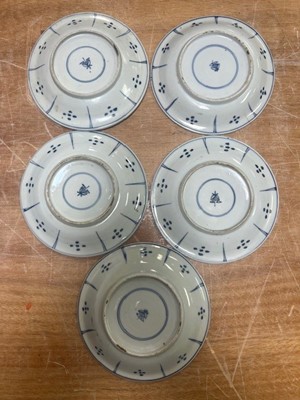 Lot 61 - A collection of nine Japanese polychrome...