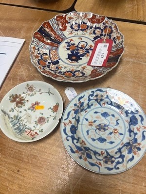 Lot 61 - A collection of nine Japanese polychrome...