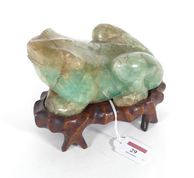 Lot 29 - A Chinese hardstone frog, 20th century, the...
