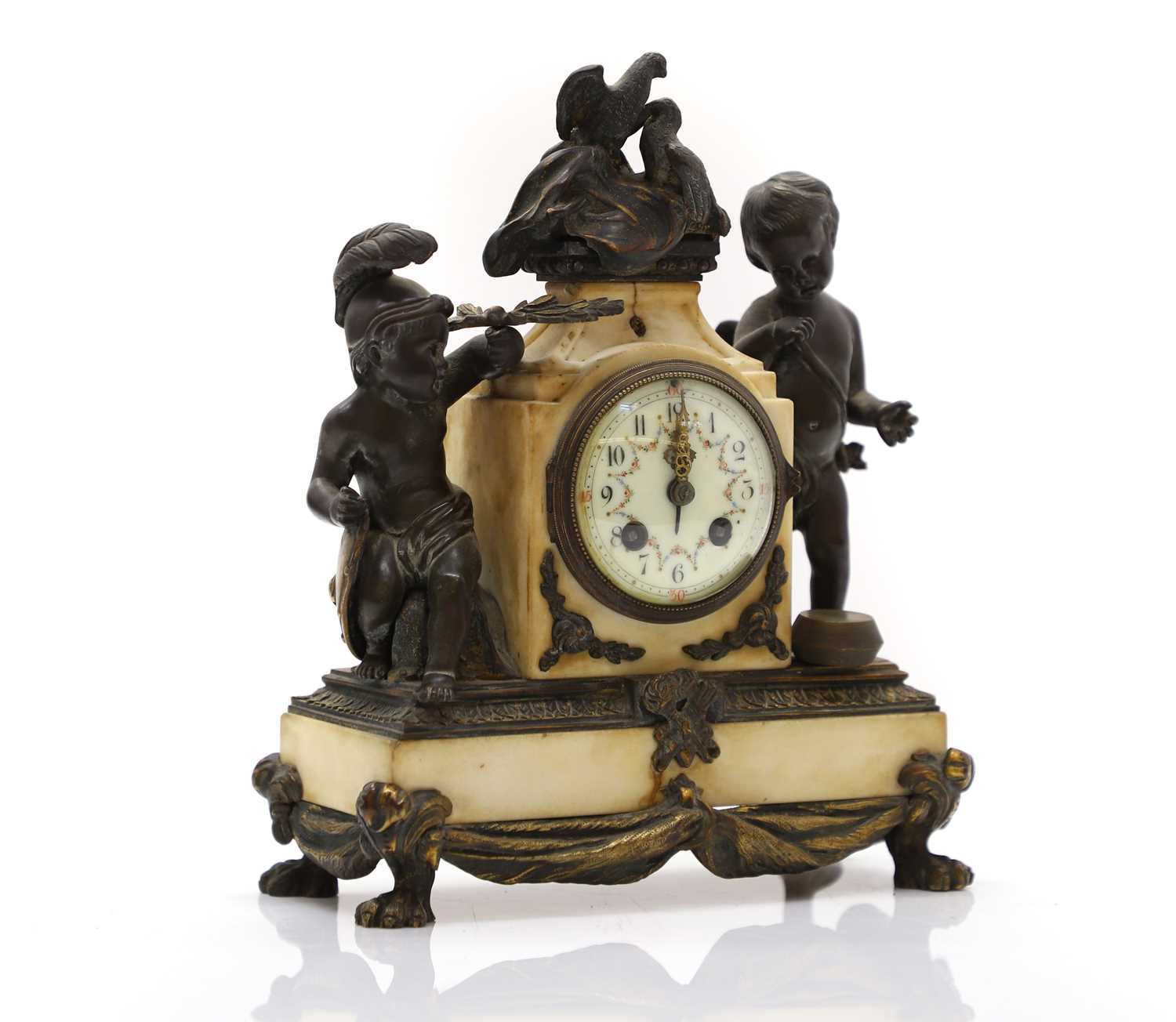 Lot 28 - A French bronze and marble mantel clock, late...