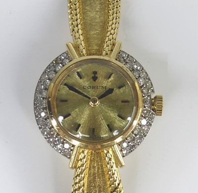 Lot 2535 - A lady's Corum 18ct gold cased and diamond set...