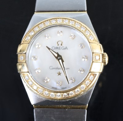 Lot 2542 - A lady's Omega constellation bi-metal bracelet...