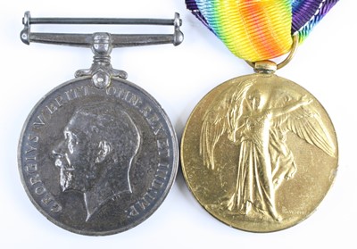Lot 622 - A pair of WW I British War and Victory Medals,...