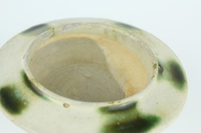 Lot 116 - Two Chinese Sancai-type wares and a celadon...