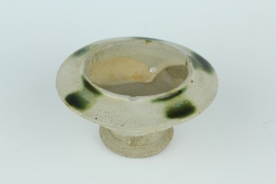 Lot 116 - Two Chinese Sancai-type wares and a celadon...