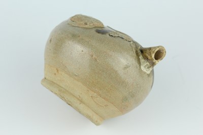 Lot 116 - Two Chinese Sancai-type wares and a celadon...