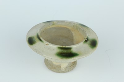 Lot 116 - Two Chinese Sancai-type wares and a celadon...
