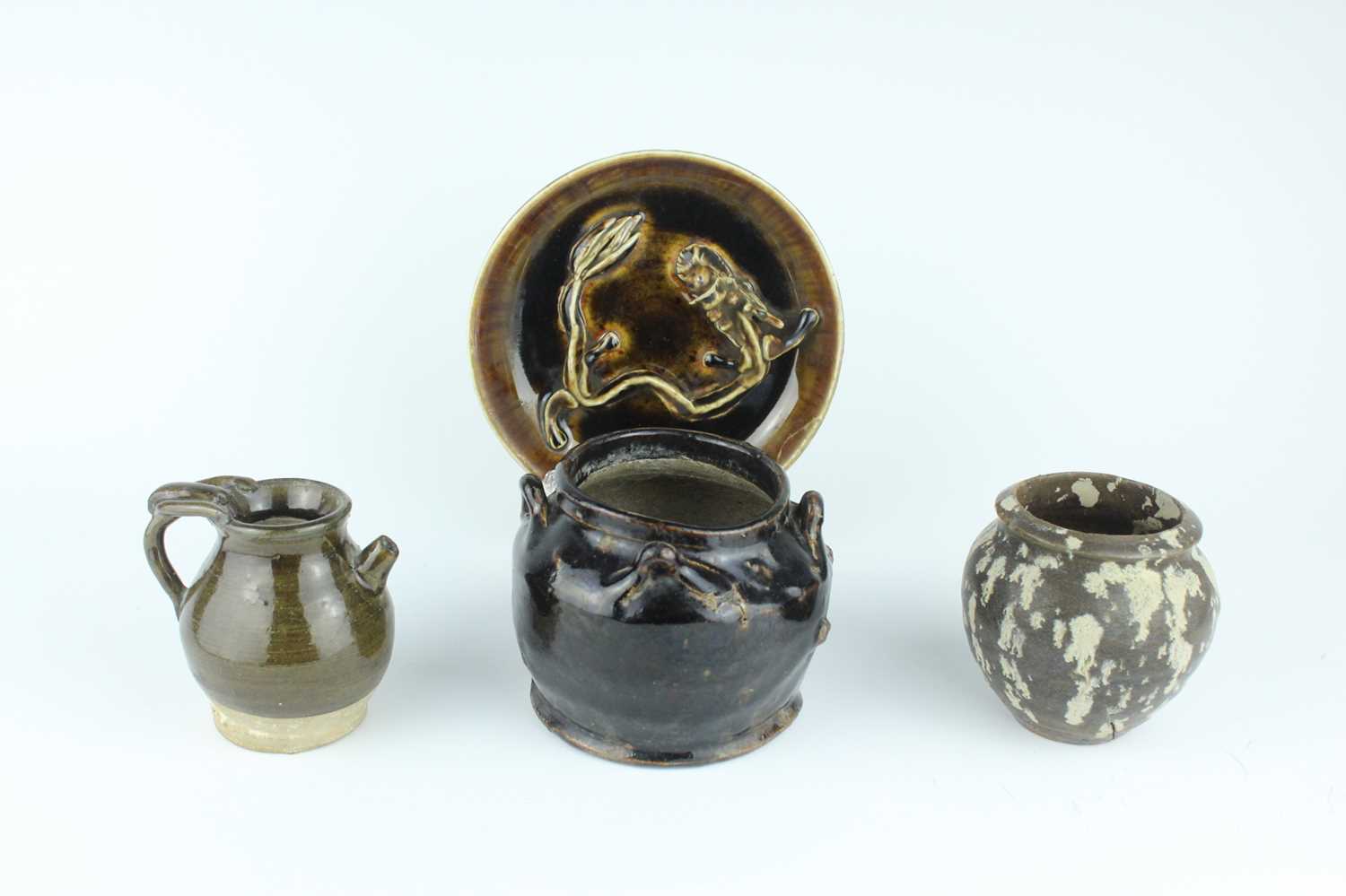 Lot 119 - A group of four Chinese black and...