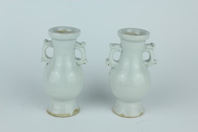 Lot 112 - A group of four small Chinese white and pale...