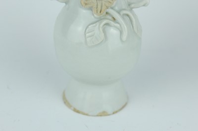 Lot 112 - A group of four small Chinese white and pale...