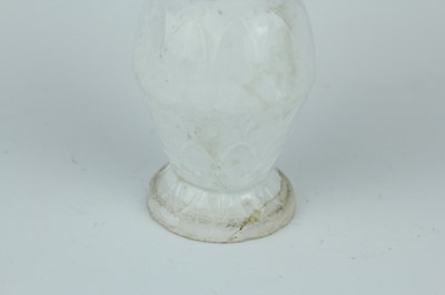 Lot 112 - A group of four small Chinese white and pale...