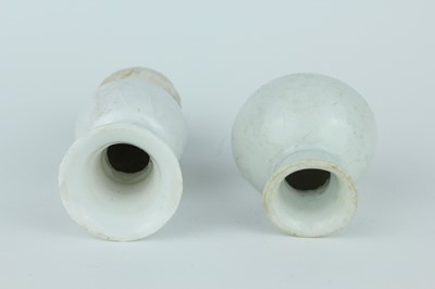 Lot 112 - A group of four small Chinese white and pale...