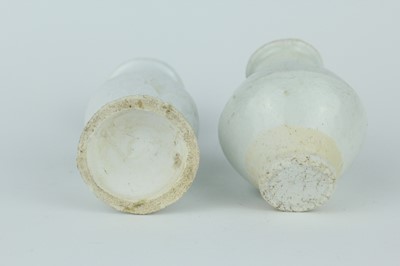 Lot 112 - A group of four small Chinese white and pale...