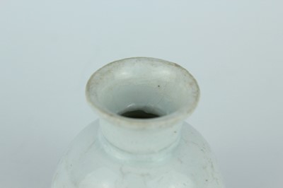 Lot 112 - A group of four small Chinese white and pale...