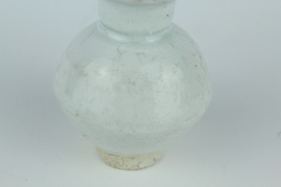Lot 112 - A group of four small Chinese white and pale...