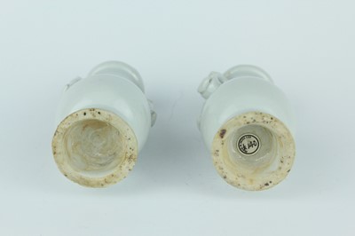 Lot 112 - A group of four small Chinese white and pale...
