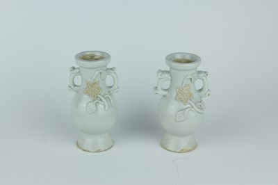 Lot 112 - A group of four small Chinese white and pale...