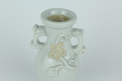 Lot 112 - A group of four small Chinese white and pale...