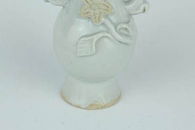 Lot 112 - A group of four small Chinese white and pale...