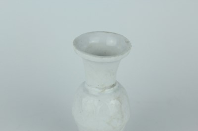 Lot 112 - A group of four small Chinese white and pale...