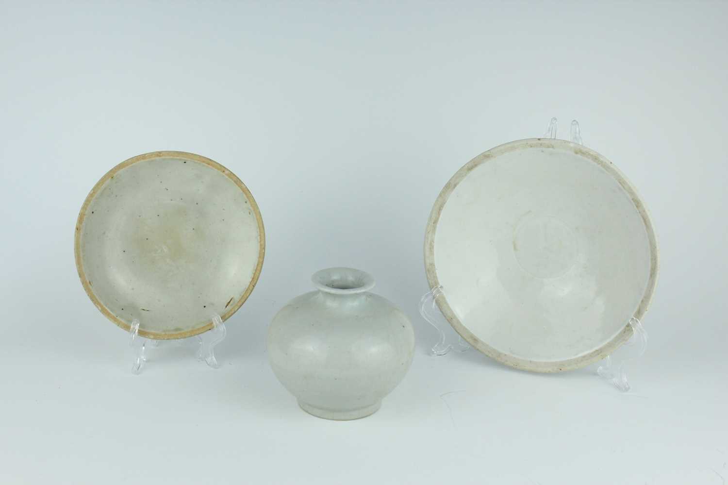 Lot 113 - A group of three Chinese white-glazed wares,...