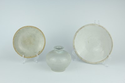 Lot 113 - A group of three Chinese white-glazed wares,...