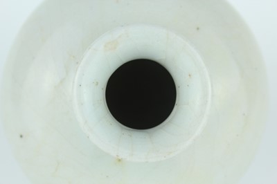 Lot 113 - A group of three Chinese white-glazed wares,...