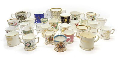 Lot 62 - A collection of commemorative pottery mugs,...
