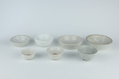Lot 114 - A group of seven Chinese white-glazed wares,...