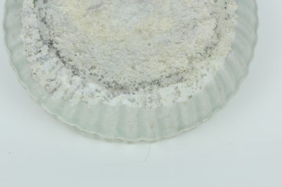 Lot 111 - A Chinese pale celadon-glazed box and cover,...