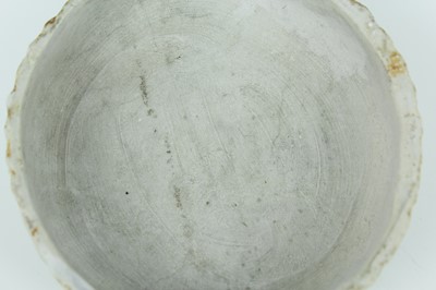 Lot 111 - A Chinese pale celadon-glazed box and cover,...