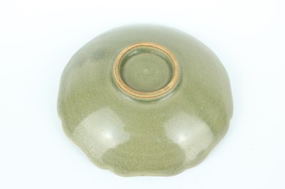 Lot 105 - Two Chinese olive-green celadon-glazed wares,...