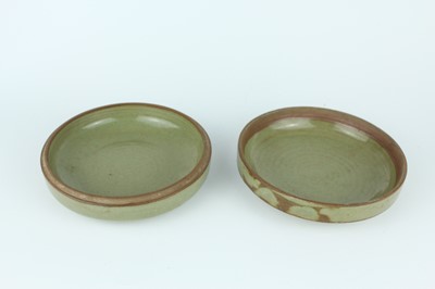 Lot 105 - Two Chinese olive-green celadon-glazed wares,...