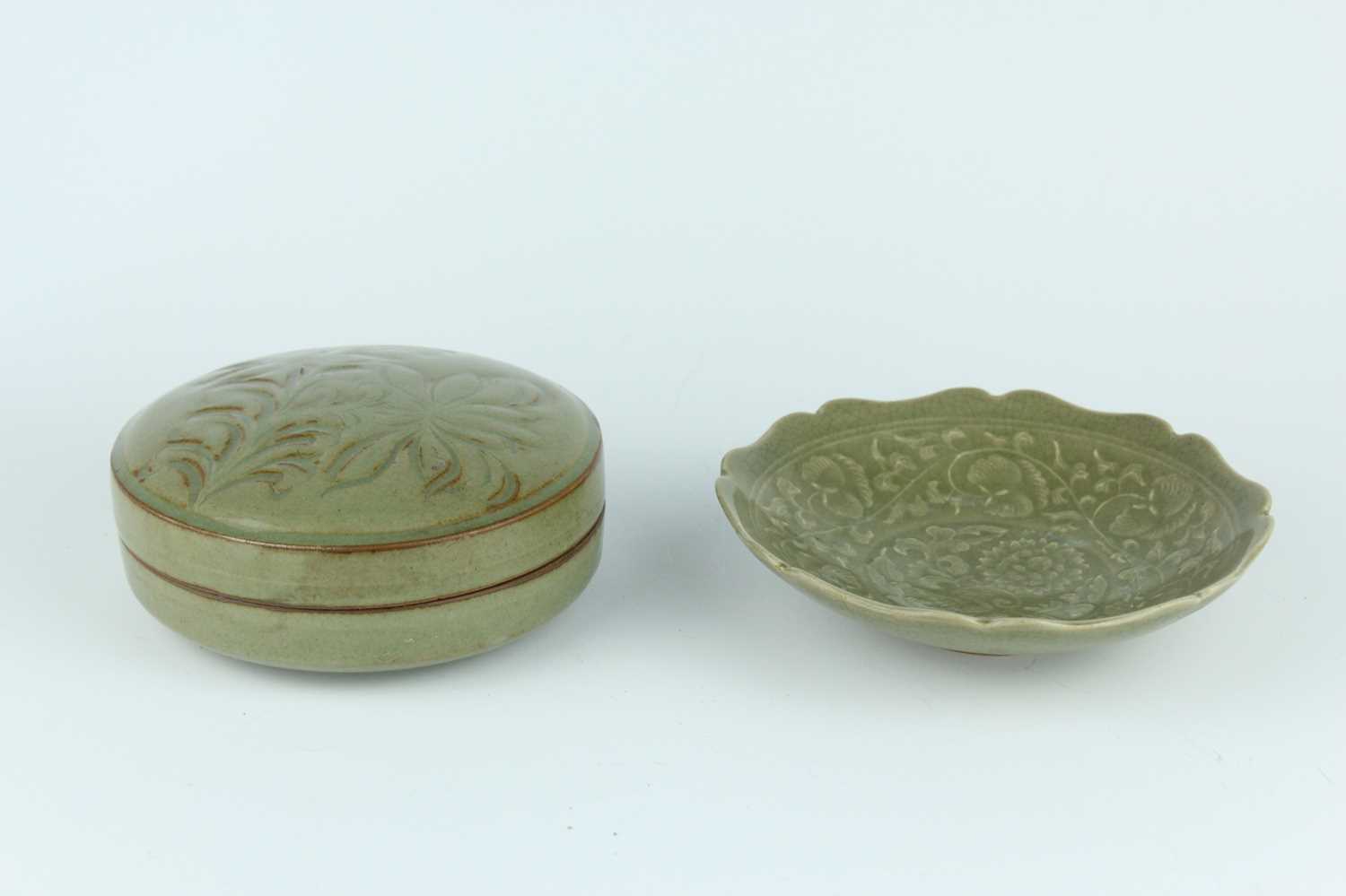 Lot 105 - Two Chinese olive-green celadon-glazed wares,...
