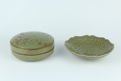 Lot 105 - Two Chinese olive-green celadon-glazed wares,...