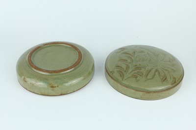Lot 105 - Two Chinese olive-green celadon-glazed wares,...