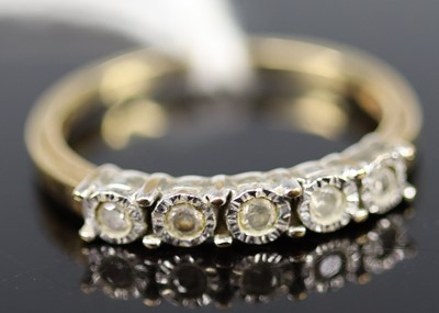 Lot 326 - A 9ct gold diamond half eternity ring,...